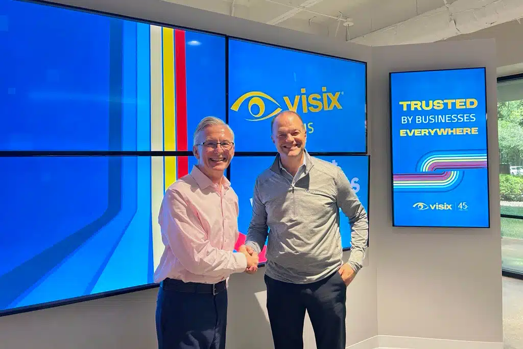 Uniguest's Matt Goche and Visix's Sean Matthews Acquisition Handshake